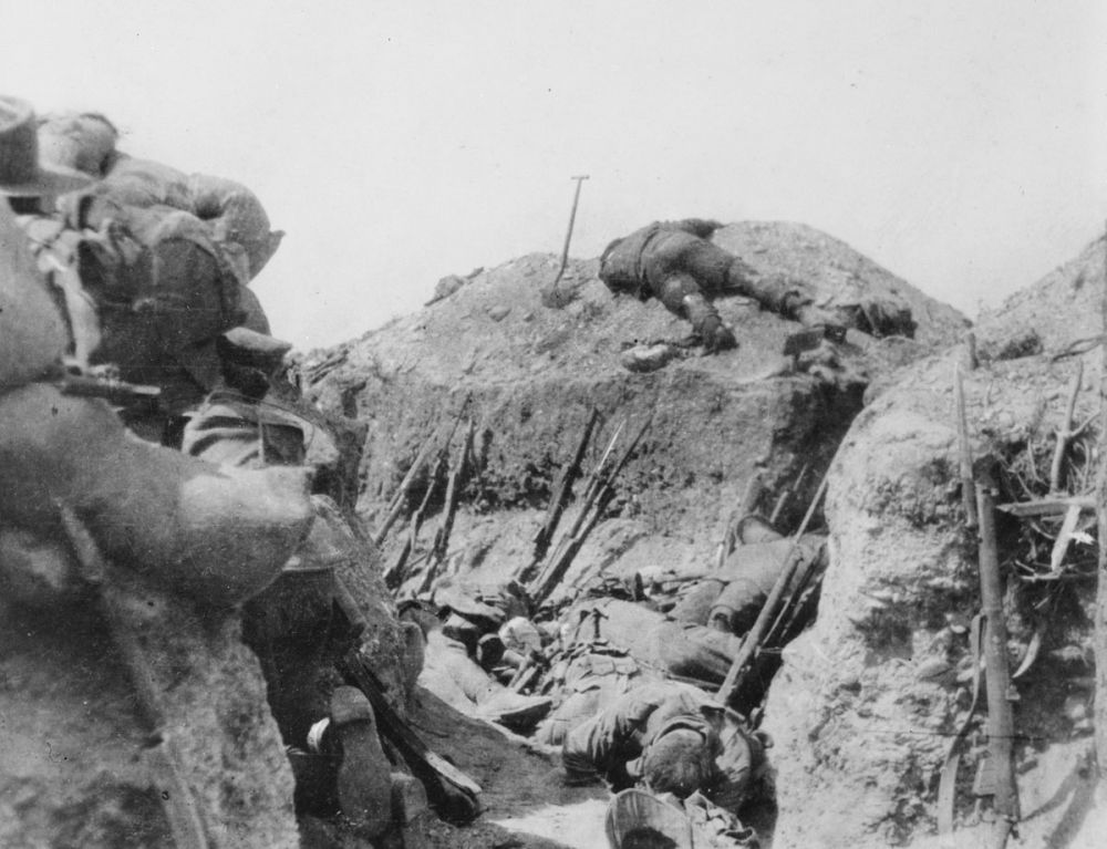The bodies of Australian soldiers in and above Southern Trench at Lone Pine. Two survivors of the battle are pressed closely to the left wall.